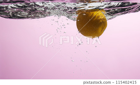 Fresh fruit falling into the water. Organic fruits for making effective juices for dieting. 115402415