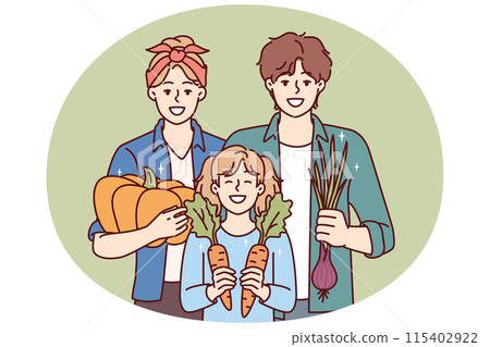 Gardening family posing with organic vegetables grown on own farm and rejoice in good harvest 115402922
