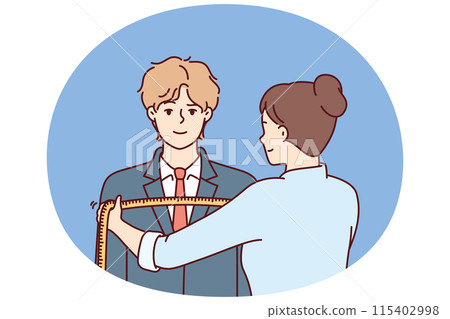 Woman tailor measures shoulders of man in centimeters to make formal suit to individual measurements Woman tailor measures shoulders of man in centimeters to make formal suit to individual measurements 115402998