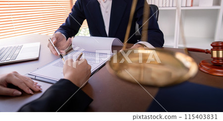 Professional Lawyer Signing Business Contract in Office with Client, Legal Agreement, Law Firm, Business Deal, Corporate Legal Services, Attorney at Work, Business Partnership, Legal Documentation Professional Lawyer Signing Business Contract in Office with Client, Legal Agreement, Law Firm, Business Deal, Corporate Legal Services, Attorney at Work, Business Partnership, Legal Documentation 115403831