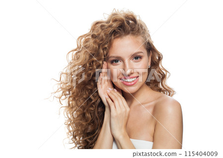 Nice fashion model with frizzy hair, natural makeup and healthy clean skin posing 115404009