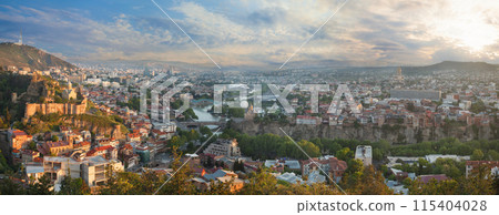 Panorama of old Tbilisi on the background of beautiful cloudy sky 115404028
