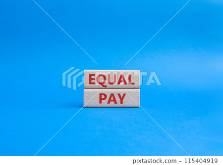 Equal Pay symbol. Wooden blocks with words Equal Pay. Beautiful blue background. Business and Equal Pay concept. Copy space. Equal Pay symbol. Wooden blocks with words Equal Pay. Beautiful blue background. Business and Equal Pay concept. Copy space. 115404919