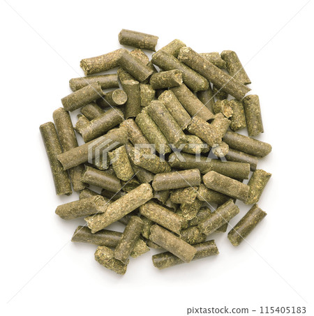 Top view of dry  green grass pellets Top view of dry  green grass pellets 115405183