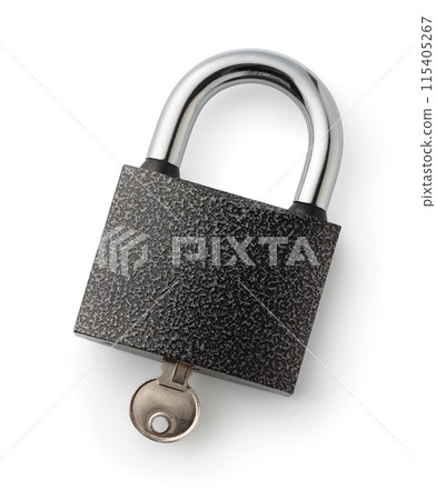 Top view of steel padlock with inserted key 115405267