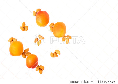 Taste of summer.Fresh ripe apricot fruits, kernels isolated on white Taste of summer.Fresh ripe apricot fruits, kernels isolated on white 115406736