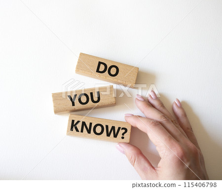 Do you know symbol. Concept word Do you know on wooden cubes. Businessman hand. Beautiful white background. Business and Do you know concept. Copy space. 115406798