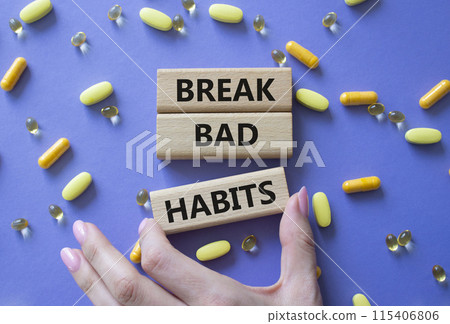 Break bad habits symbol. Concept words Break bad habits on wooden blocks. Beautiful purple background with pills. Doctor hand. Medicine and Break bad habits concept. Copy space. Break bad habits symbol. Concept words Break bad habits on wooden blocks. Beautiful purple background with pills. Doctor hand. Medicine and Break bad habits concept. Copy space. 115406806
