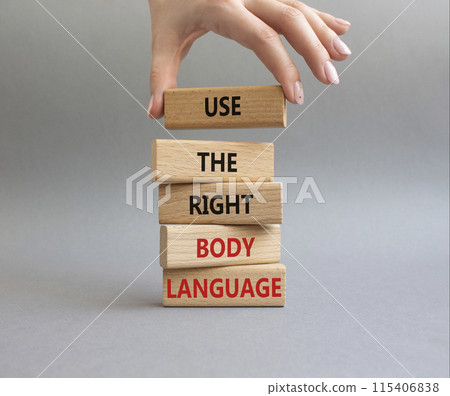 Use the right Body Language symbol. Concept words Use the right Body Language on wooden blocks. Businessman hand. Beautiful grey background. Business concept. Copy space Use the right Body Language symbol. Concept words Use the right Body Language on wooden blocks. Businessman hand. Beautiful grey background. Business concept. Copy space 115406838