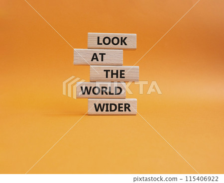 Look at the world wider symbol. Wooden blocks with words Look at the world wider. Beautiful orange background. Business and Look at the world wider concept. Copy space. Look at the world wider symbol. Wooden blocks with words Look at the world wider. Beautiful orange background. Business and Look at the world wider concept. Copy space. 115406922