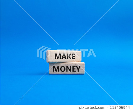 Make Money symbol. Wooden blocks with words Make Money. Beautiful blue background. Business and Make Money concept. Copy space. 115406944