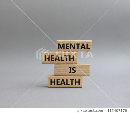 Mental Health symbol. Wooden blocks with words Mental Health is Health. Beautiful yellow background. Medical and Health concept. Copy space. 115407176