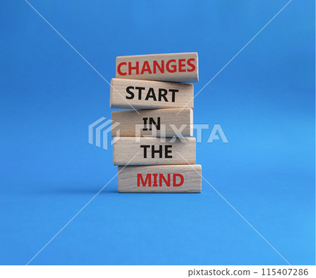 Changes start in the Mind symbol. Wooden blocks with words Changes start in the Mind. Beautiful blue background. Business and Changes start in the Mind concept. Copy space. 115407286