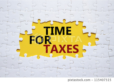 Time for Taxes symbol. Concept words Time for Taxes on white puzzle. Beautiful yellow background with succulent plant. Business and Time for Taxes concept. Copy space. Time for Taxes symbol. Concept words Time for Taxes on white puzzle. Beautiful yellow background with succulent plant. Business and Time for Taxes concept. Copy space. 115407315