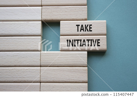 Take initiative symbol. Wooden blocks with words Take initiative. Beautiful grey green background. Business and Take initiative concept. Copy space. Take initiative symbol. Wooden blocks with words Take initiative. Beautiful grey green background. Business and Take initiative concept. Copy space. 115407447