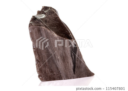 Macro stone obsidian mineral on white background Macro stone obsidian mineral on white background 115407801