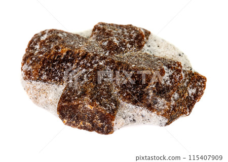 macro mineral stone Staurolite on a white background macro mineral stone Staurolite on a white background 115407909
