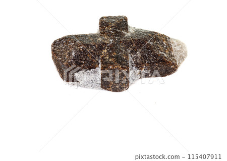 macro mineral stone Staurolite on a white background macro mineral stone Staurolite on a white background 115407911