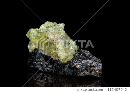 Macro stone Hyalite mineral, tourmaline Sherl, smoky quartz on a black background Macro stone Hyalite mineral, tourmaline Sherl, smoky quartz on a black background 115407942