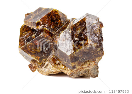 Macro stone Grossular mineral on white background 115407953