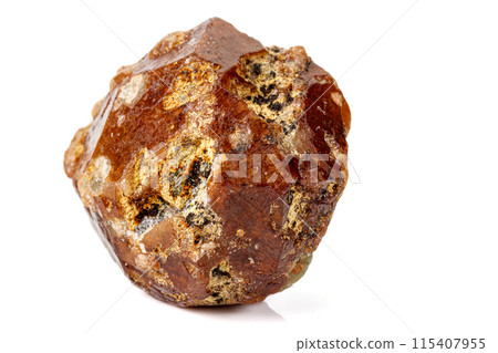 Macro stone Grossular mineral on white background Macro stone Grossular mineral on white background 115407955