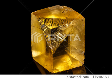 Macro stone mineral Ulexite on a black background Macro stone mineral Ulexite on a black background 115407977