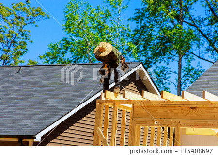 When cutting beams during construction, contractor uses cordless reciprocating saw When cutting beams during construction, contractor uses cordless reciprocating saw 115408697