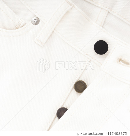 Detail of the fly of milky raw denim jeans with red selvedge and metal fittings Detail of the fly of milky raw denim jeans with red selvedge and metal fittings 115408875
