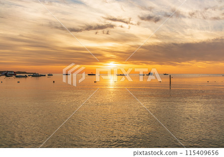 Beautiful red and orange sunrise over the sea. 115409656