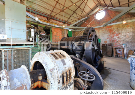 [Kumamoto Prefecture] The winding machine room of the second shaft tower of the Manda Pit of the Mitsui Miike Coal Mine on a clear day (Meiji Industrial Revolution Heritage Sites of Japan) 115409919