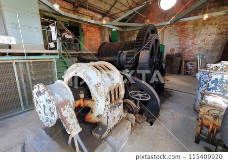 [Kumamoto Prefecture] The winding machine room of the second shaft tower of the Manda Pit of the Mitsui Miike Coal Mine on a clear day (Meiji Industrial Revolution Heritage Sites of Japan) 115409920