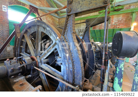 [Kumamoto Prefecture] The winding machine room of the second shaft tower of the Manda Pit of the Mitsui Miike Coal Mine on a clear day (Meiji Industrial Revolution Heritage Sites of Japan) 115409922