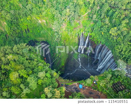 .Aerial view Thousands of waterfalls flow together at Tumpak Sewu Waterfall 115410551