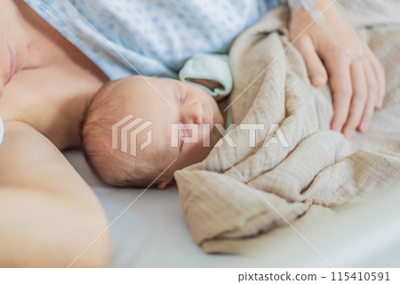 A baby lies with the mother after childbirth, resting peacefully. The serene moment captures the bond between mother and child as they begin their journey together. The hospital environment ensures a A baby lies with the mother after childbirth, resting peacefully. The serene moment captures the bond between mother and child as they begin their journey together. The hospital environment ensures a 115410591