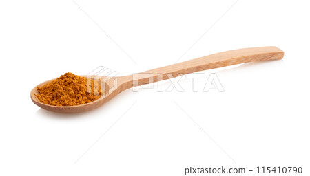 turmeric powder in spoon wooden on white background turmeric powder in spoon wooden on white background 115410790