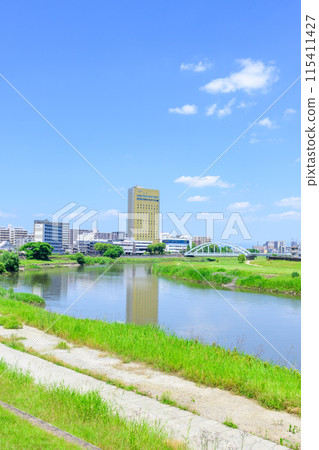 Scenery around Kumamoto Station on a beautiful, clear blue sky (East Exit Station, Transportation) [Scenery around the Shirakawa River] 115411427