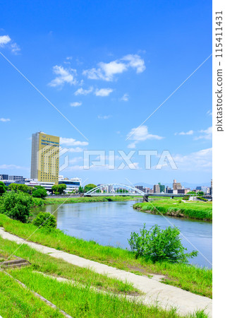 Scenery around Kumamoto Station on a beautiful, clear blue sky (East Exit Station, Transportation) [Scenery around the Shirakawa River] 115411431