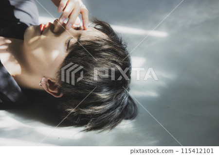 Man wearing colored contact lenses Man wearing colored contact lenses 115412101