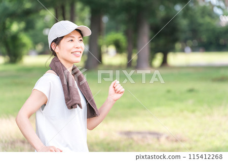 A woman who exercises, trains, and walks for a diet A woman who exercises, trains, and walks for a diet 115412268