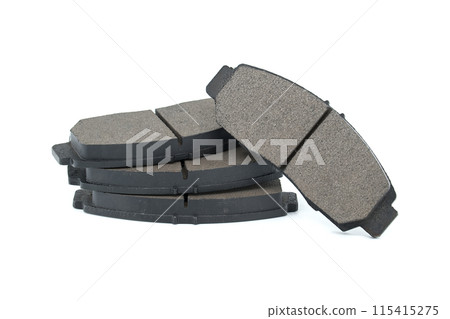New auto brake pads isolated on white background New auto brake pads isolated on white background 115415275