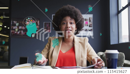 Image of media icons over african american businesswoman having image call and smiling Image of media icons over african american businesswoman having image call and smiling 115415627
