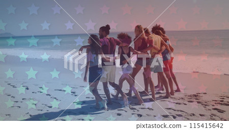 Group of young adults walking together on a beach Group of young adults walking together on a beach 115415642