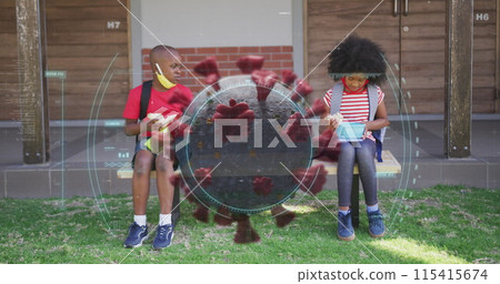 Image of scope over covid 19 cell with masked children social distancing eating at school Image of scope over covid 19 cell with masked children social distancing eating at school 115415674