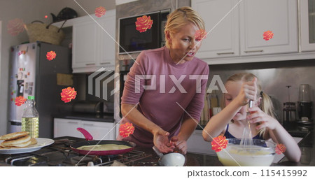 Image of flowers over happy caucasian mother and daughter cooking together 115415992