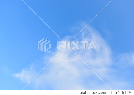 beautiful blue sky and white fluffy group of clouds with sunrise in the morning, natural background 115416109