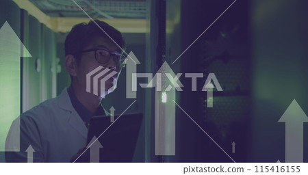 Image of white arrows over asian male it engineer with tablet checking computer servers 115416155