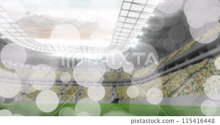 Image of falling glowing lights over football stadium Image of falling glowing lights over football stadium 115416448