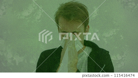 Image of 3D coronavirus Covid 19 cells spreading over Caucasian man sneezing Image of 3D coronavirus Covid 19 cells spreading over Caucasian man sneezing 115416474