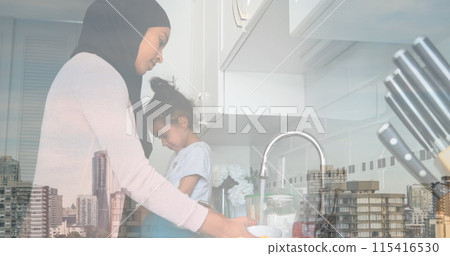 Image of asian mother with daughter in kitchen over cityscape Image of asian mother with daughter in kitchen over cityscape 115416530