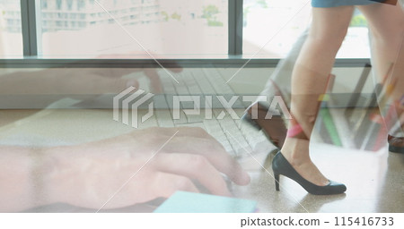 Image of hands using laptop over male and female colleague walking in modern building Image of hands using laptop over male and female colleague walking in modern building 115416733